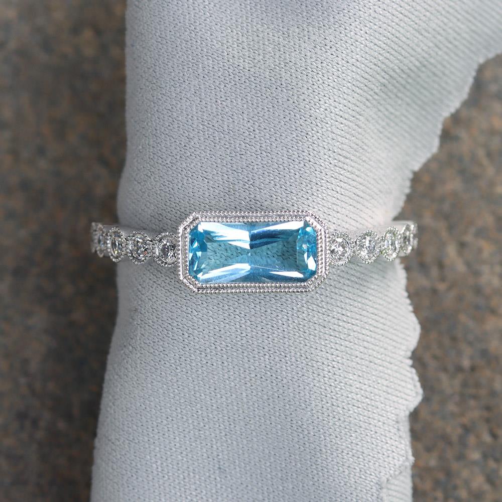 East to West Blue Topaz & Diamond Ring