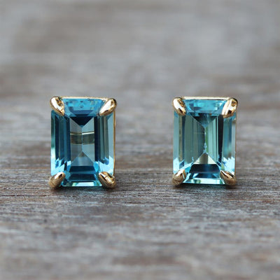 Swiss Blue Topaz Emerald Cut Stud Earrings in 14k Yellow Gold