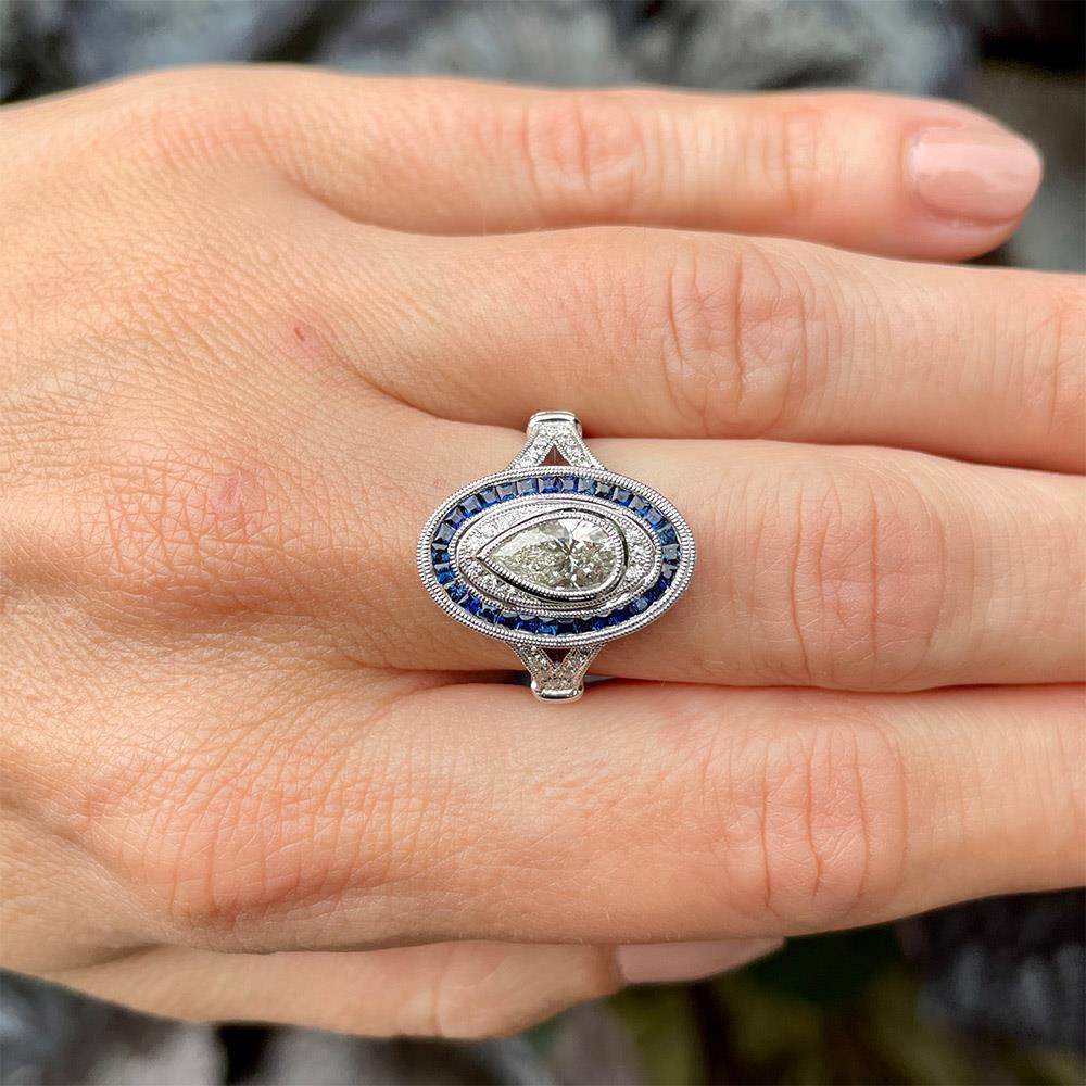 Stately Pear Diamond and Blue Sapphire Ring