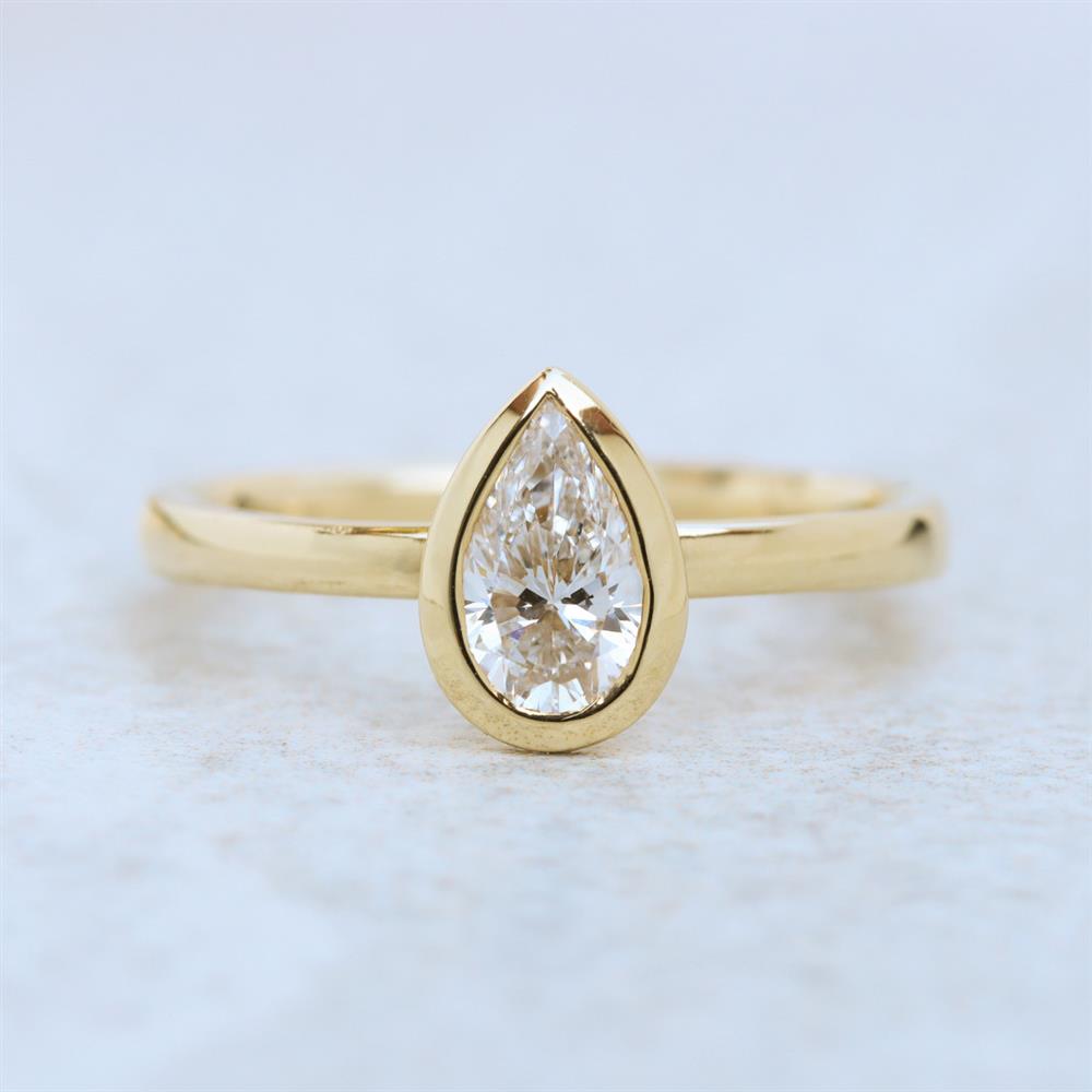 Modern Pear 0.71ct Lab Grown Diamond Bezel Solitaire Ring in 14k Yellow Gold