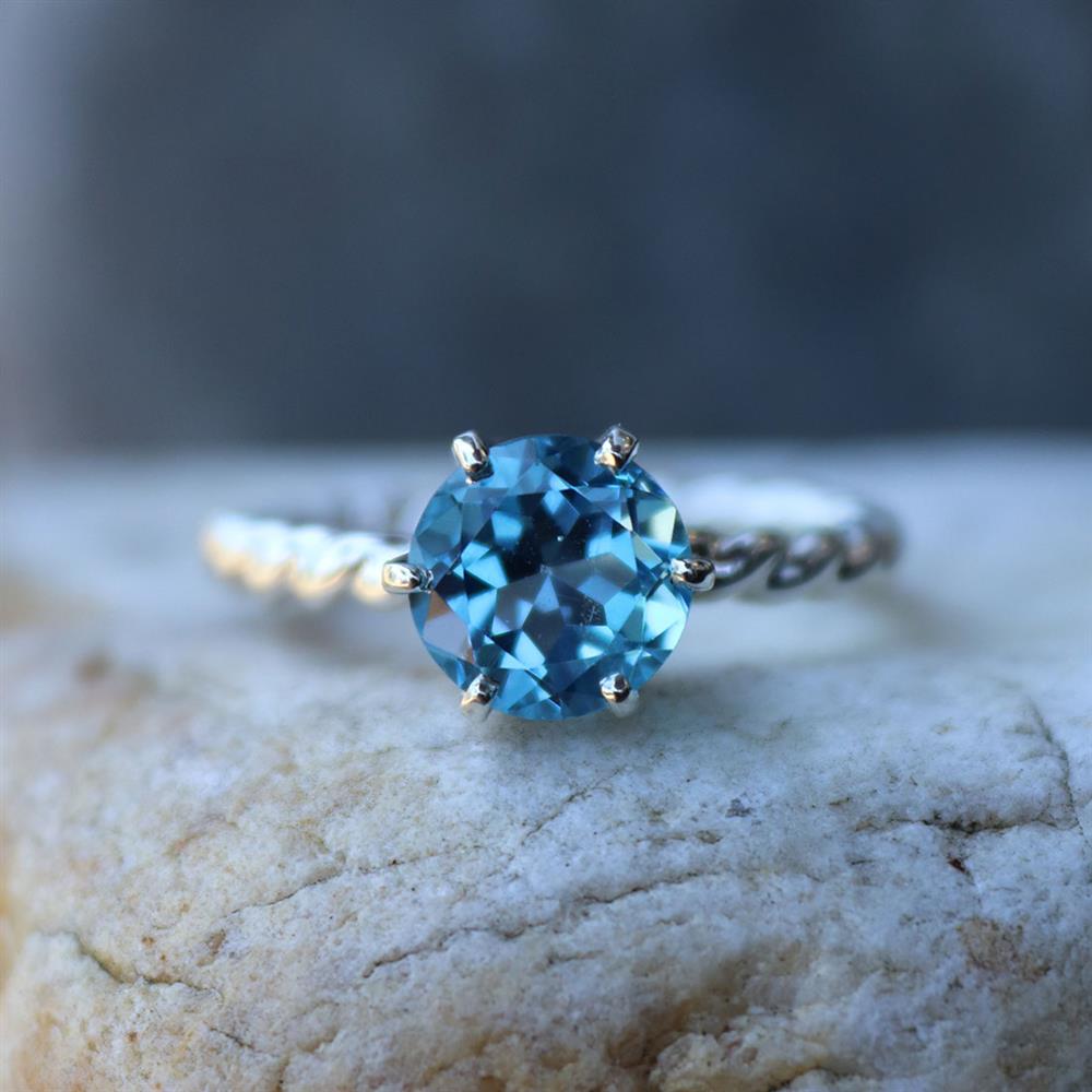 Swiss Blue Topaz Twist Ring in Sterling Silver