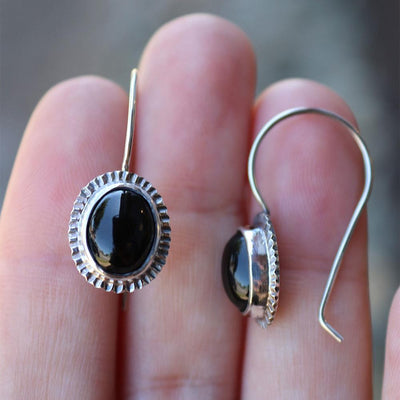 Oval Onyx Burst Halo Earrings in Sterling Silver