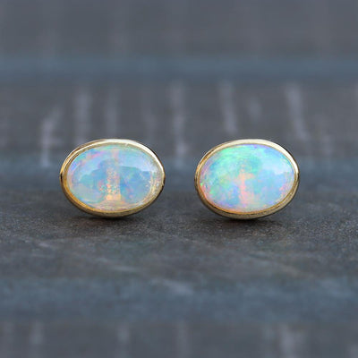 Oval Opal Stud Earrings in 14k Yellow Gold