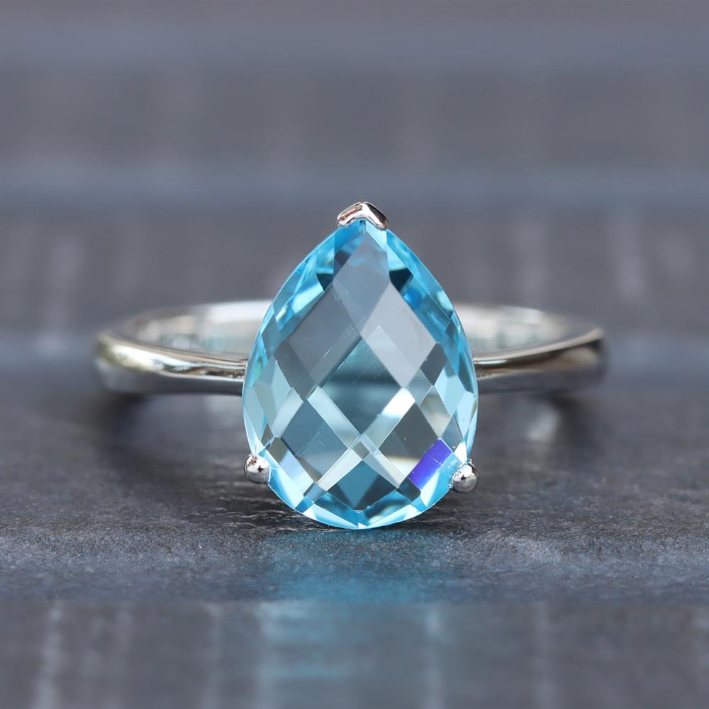 Gemmy Pear Blue Topaz Ring in Sterling Silver