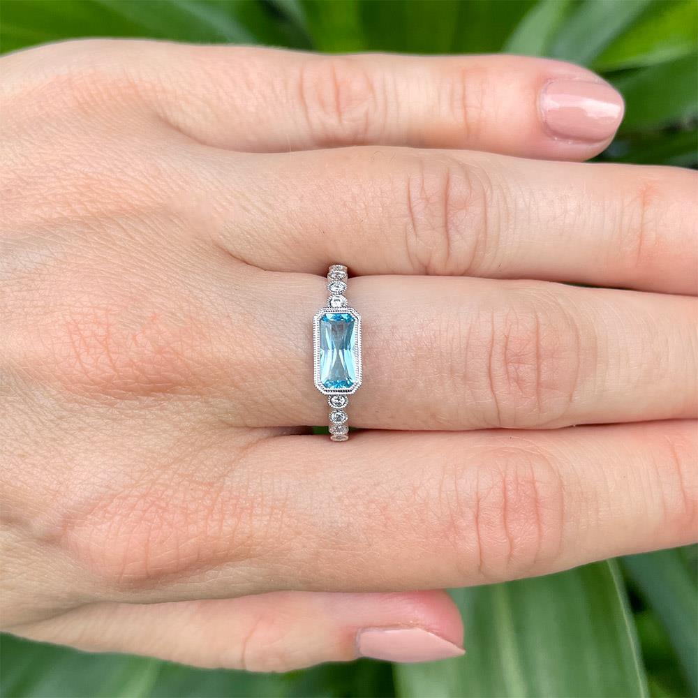 East to West Blue Topaz & Diamond Ring
