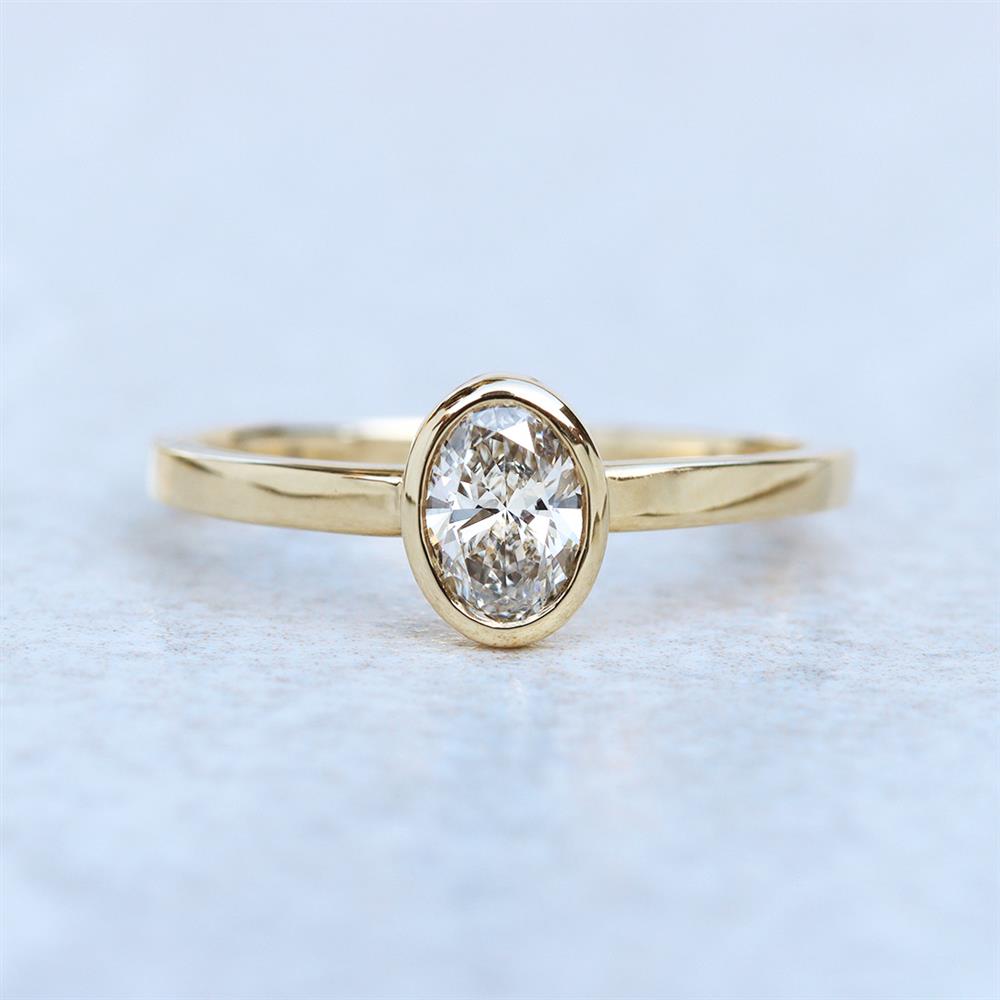 Modern Oval 0.47ct Lab Grown Diamond Bezel Solitaire Ring in 14k Yellow Gold