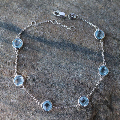 Bejeweled Blue Topaz Station Bracelet in Sterling Silver